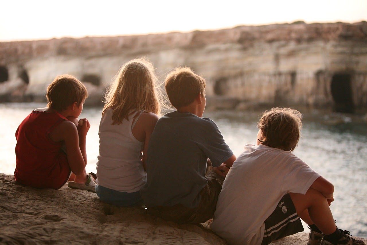 group of children by the sea