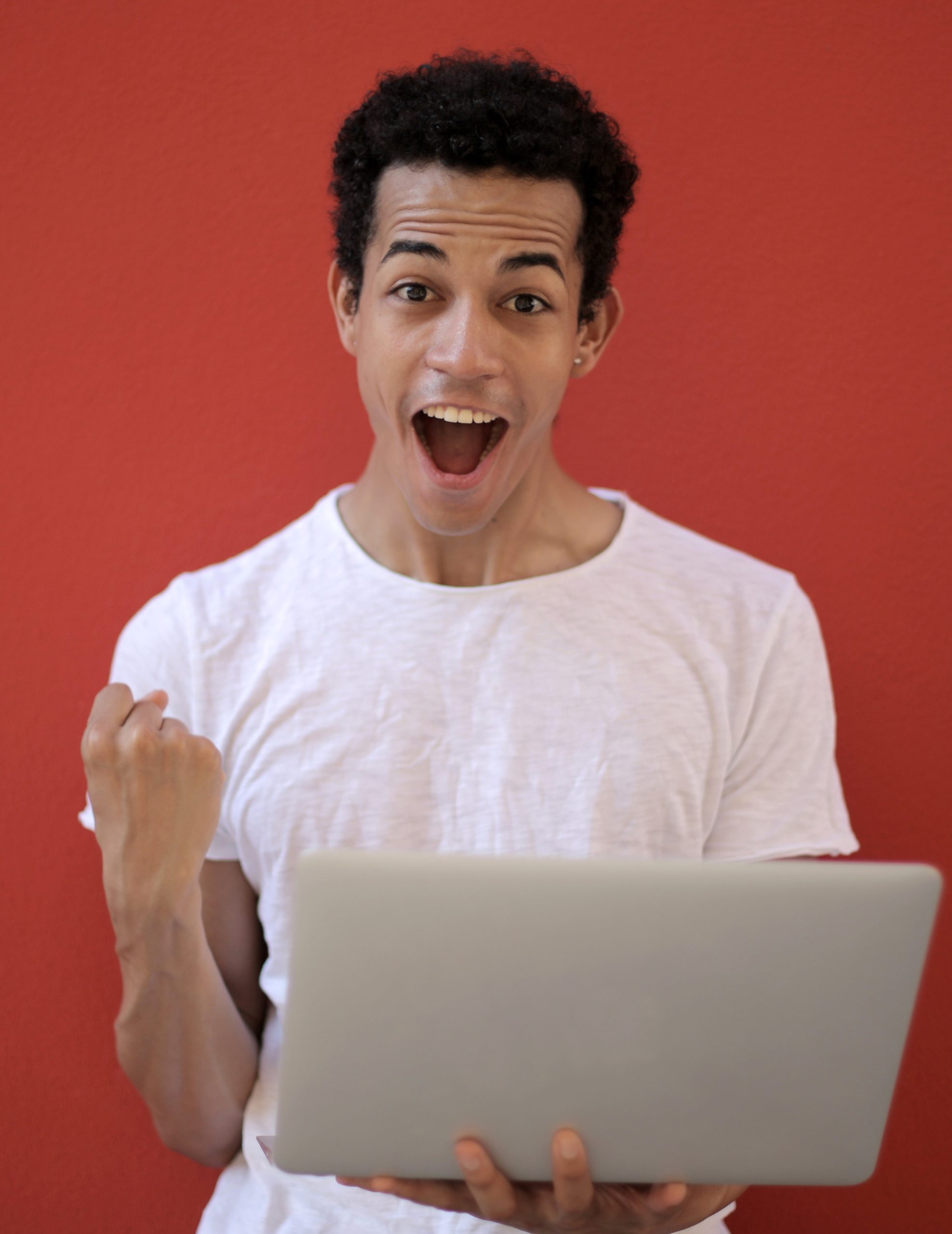 happy student with laptop