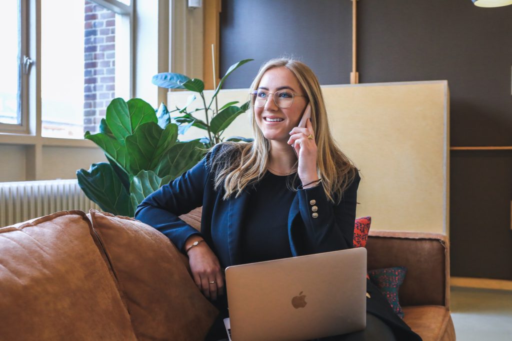 woman on phone smiling