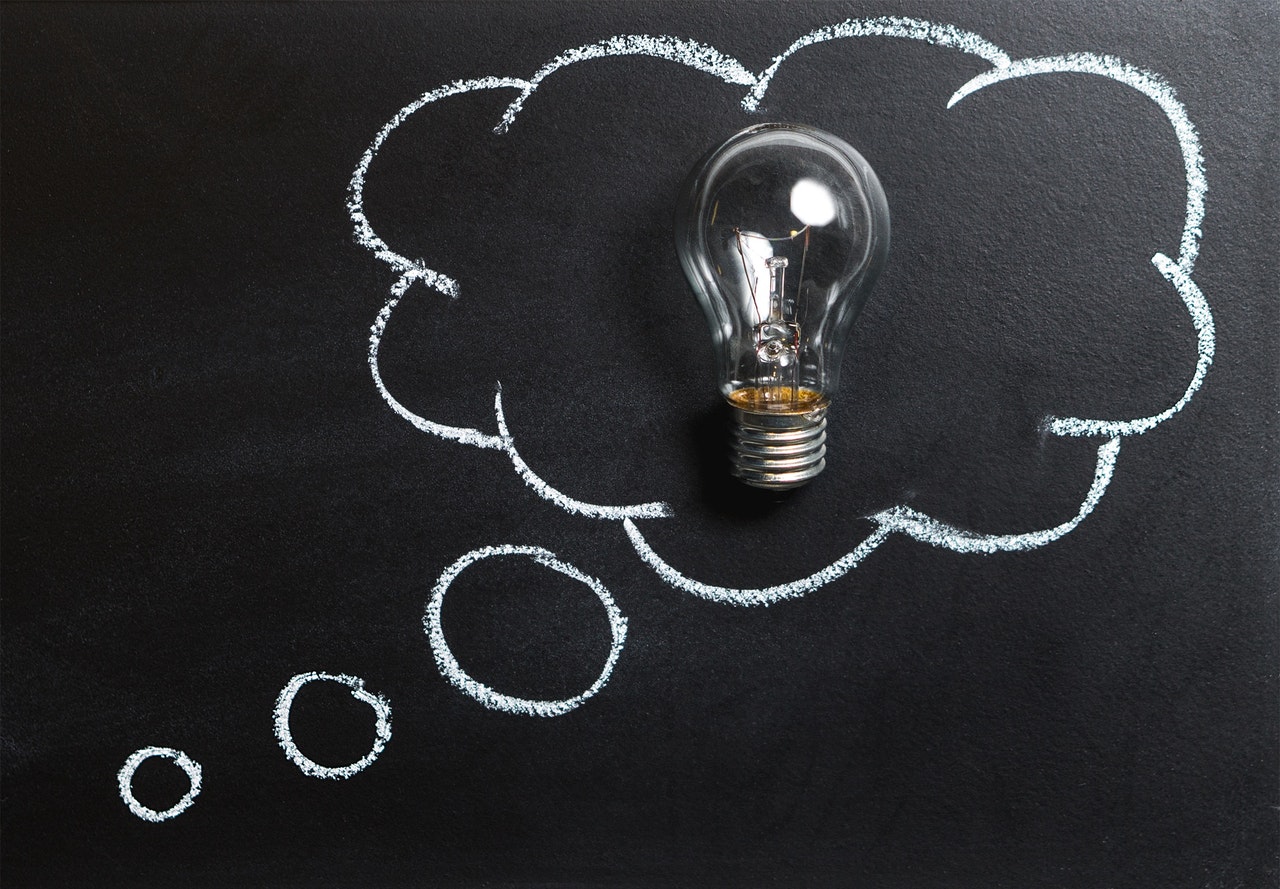 lightbulb on black board