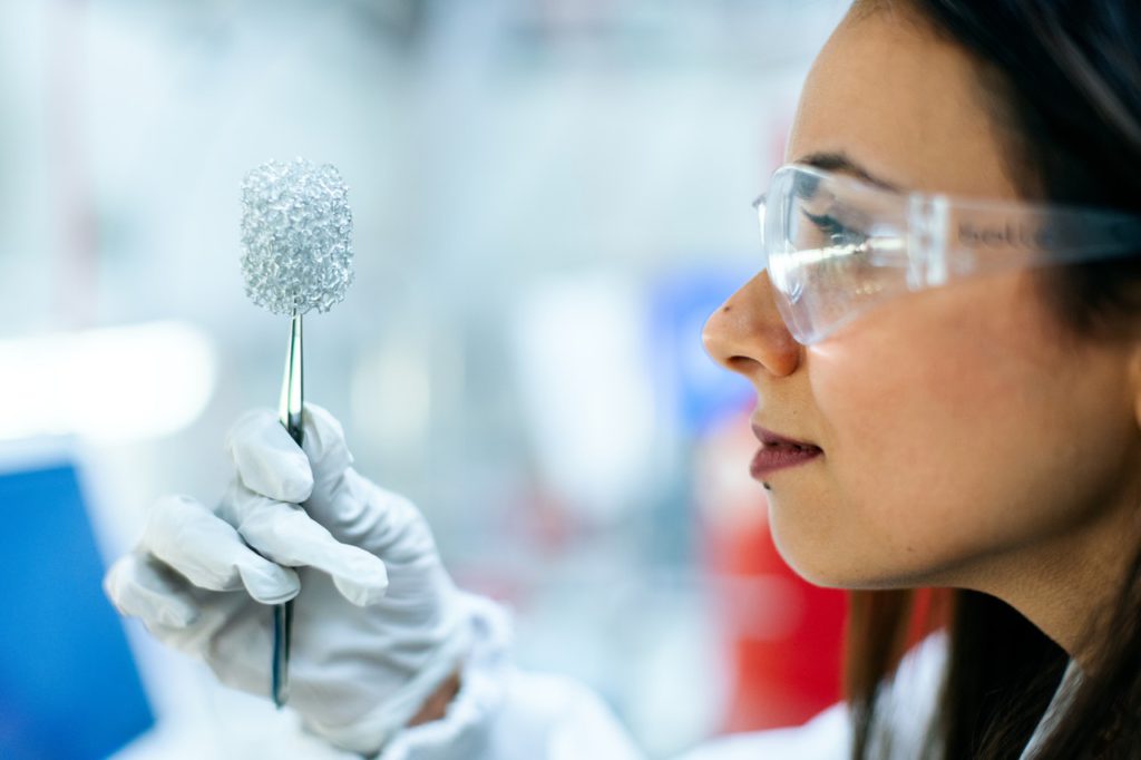 Scientist looking at material 