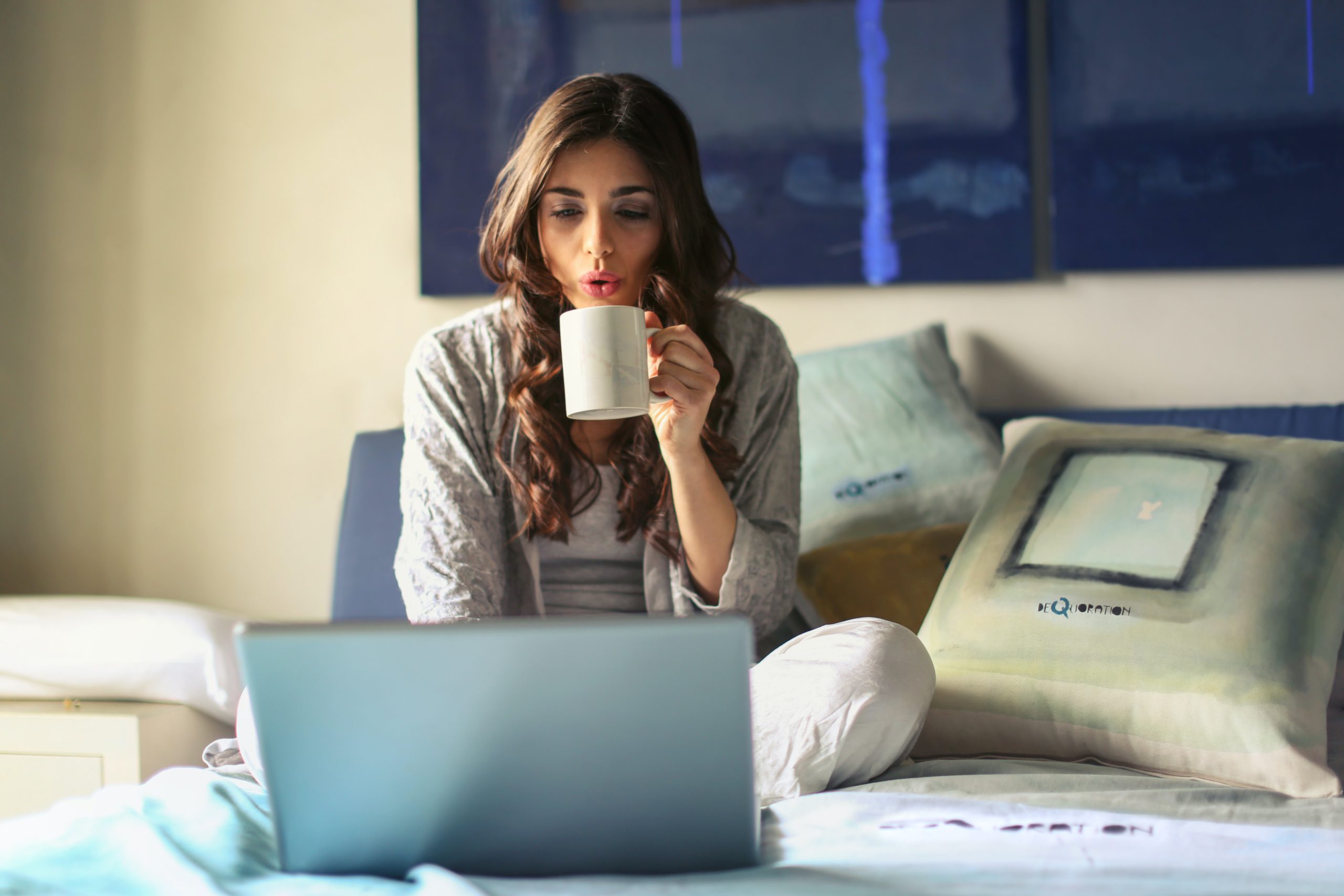 student enjoying free time on laptop