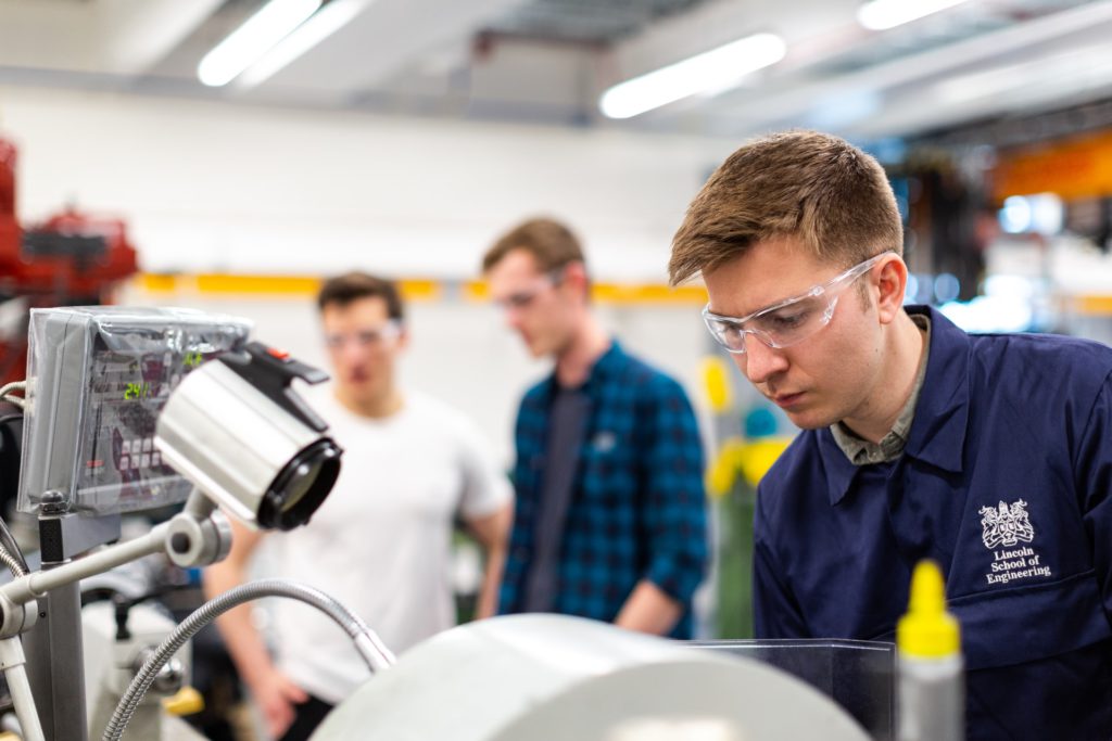 Engineering students in lab 