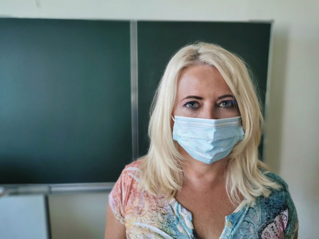 online tutor wearing mask