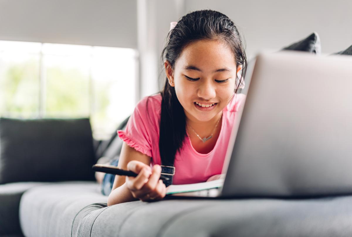 Student studying online on laptop