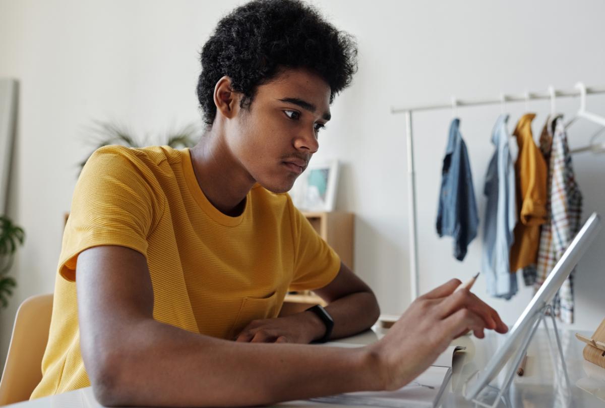 A Level student working on laptop