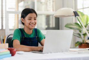 Student working from home on laptop